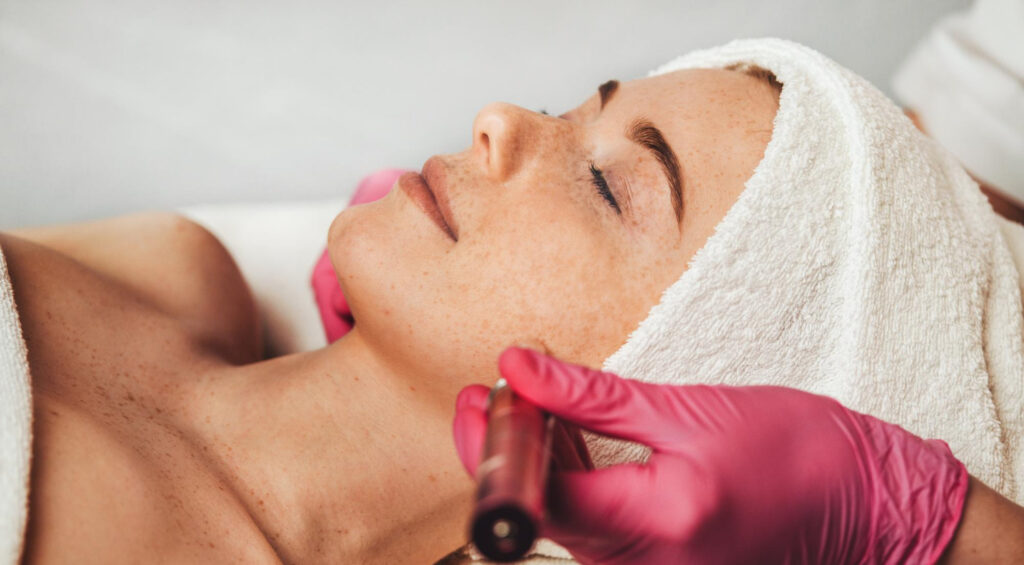 Close up woman getting hyperpigmentation treatment at medical spa