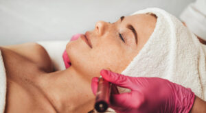 Close up woman getting hyperpigmentation treatment at medical spa