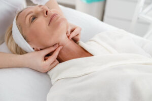 Dermal fillers for chin evaluation skin patient on medical spa